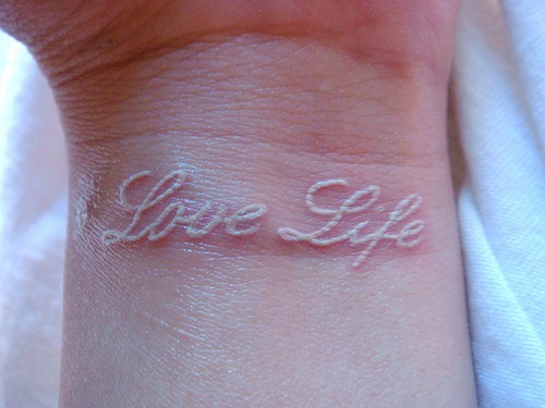 White ink tattoos on wrist Love life wrist tattoo Simple and beautiful tattoo