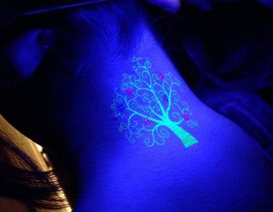 Glowing UV Tattoo on the Neck