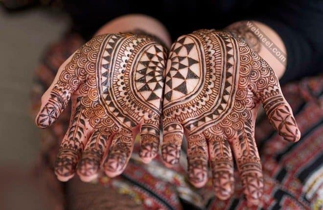 Black henna tattoo on hands design