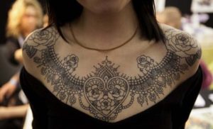 Henna black chest tattoo design