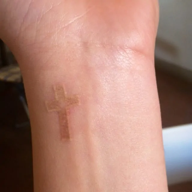 Playground Tattoo on Instagram   White Cross  whitetattoo  crosstattoo 십자가타투  Tattoos for women small Tattoos for women Wrist  tattoos for women