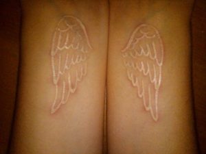 white-wings-tattoo