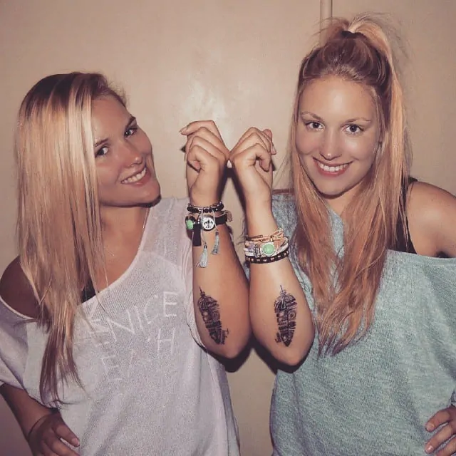 Feather tattoos for sisters