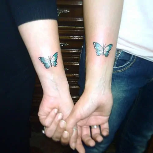 twin sisters butterfly tattoo design