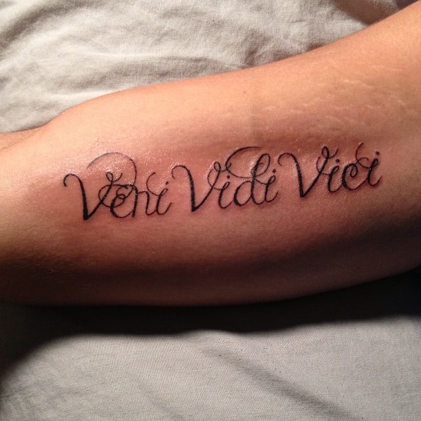 Beautiful veni vidi vici bicep tattoo for male.