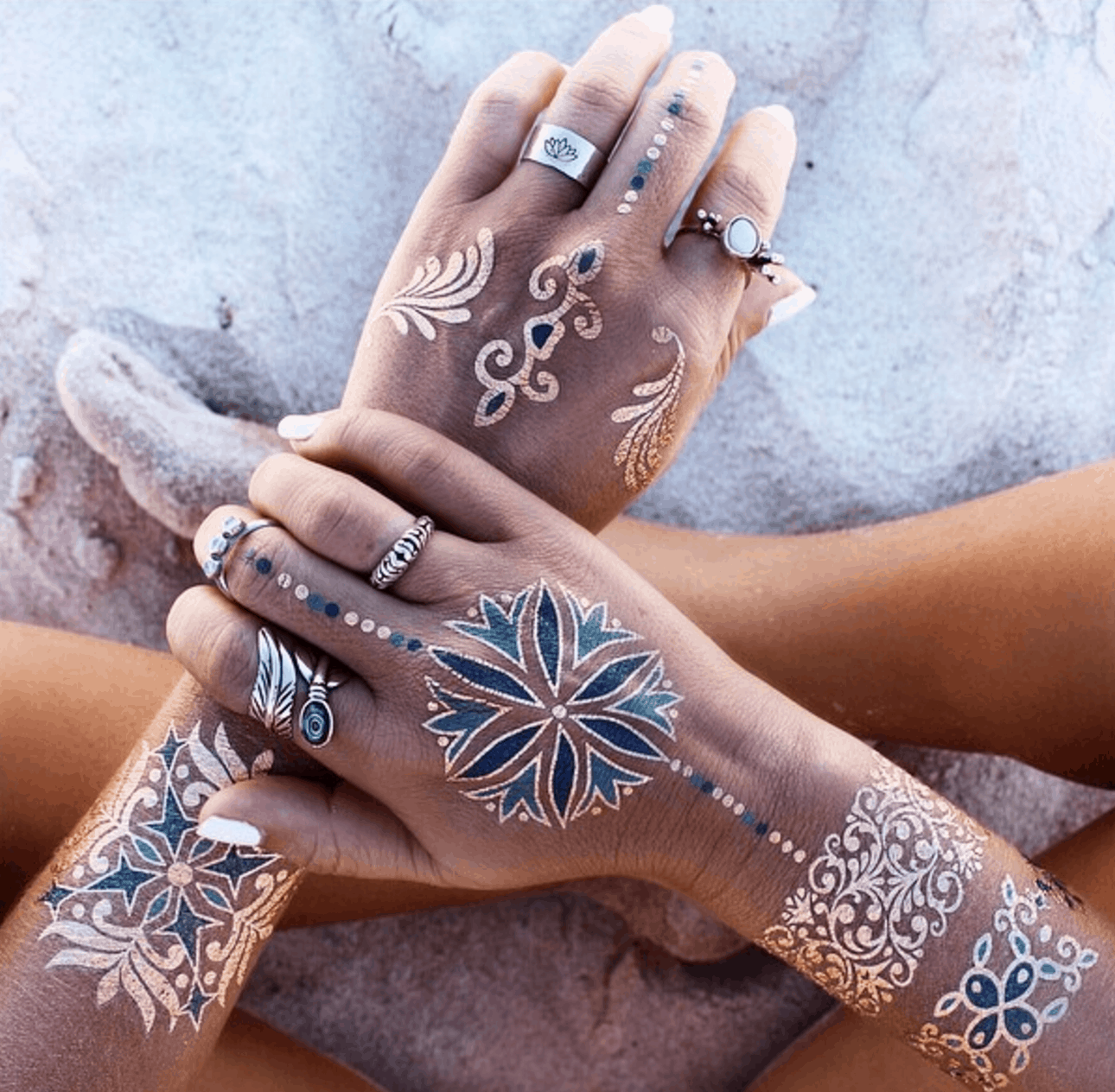 metallic golden ink hand tattoo