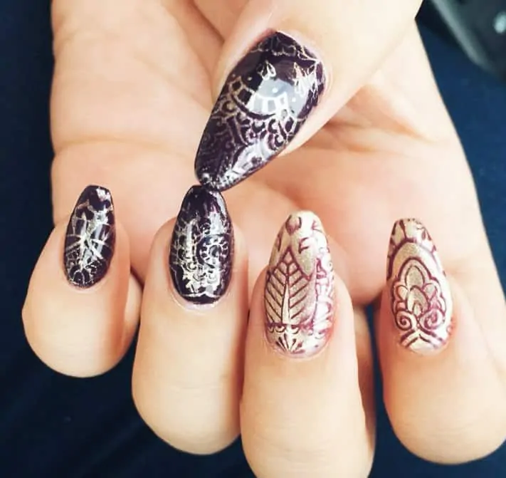 Applying henna on nails