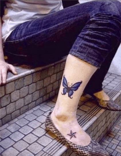Beautiful butterfly leg tattoo