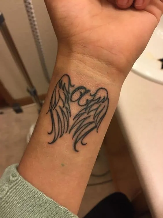 Beautiful Hand Wings Angel Tattoo Idea