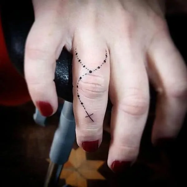 finger cross tattoo idea