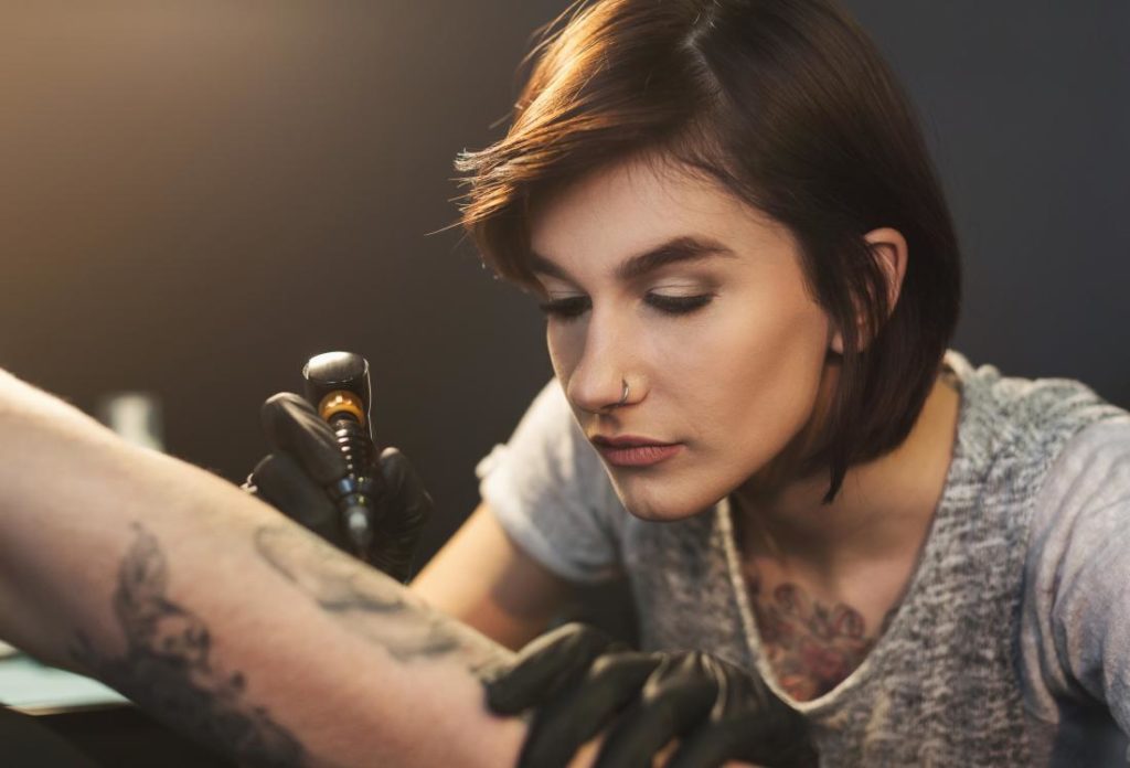 getting a tattoo for a curvy woman