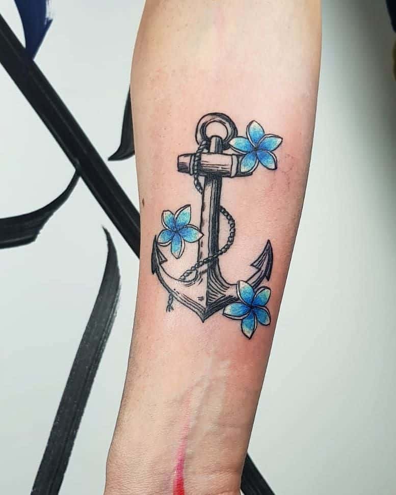 Anchor with flowers tattoo