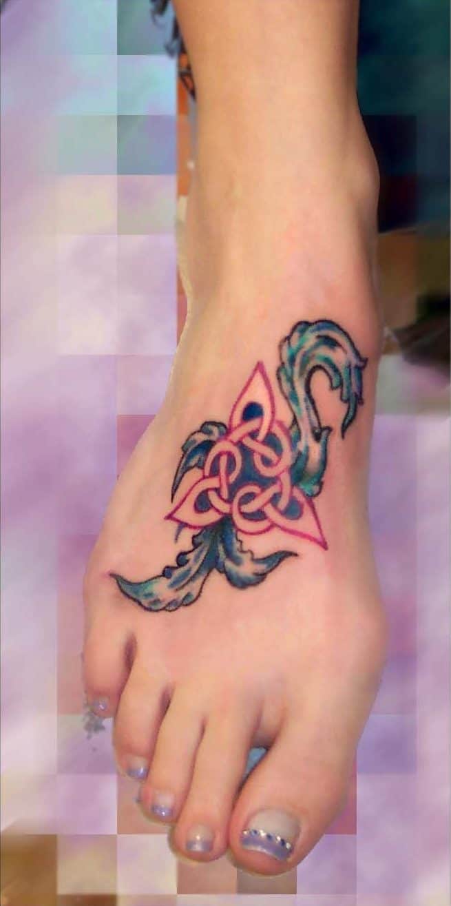 Celtic tribal foot tattoo