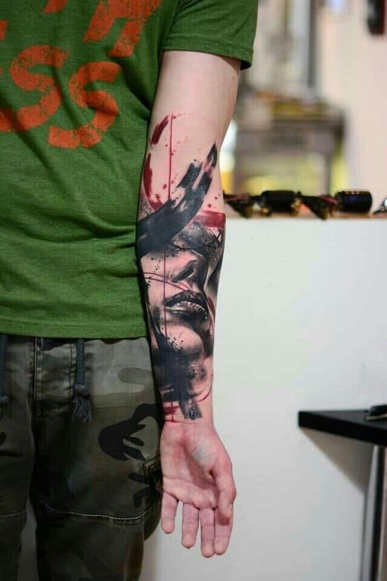Trash Polka Arm Tattoo
